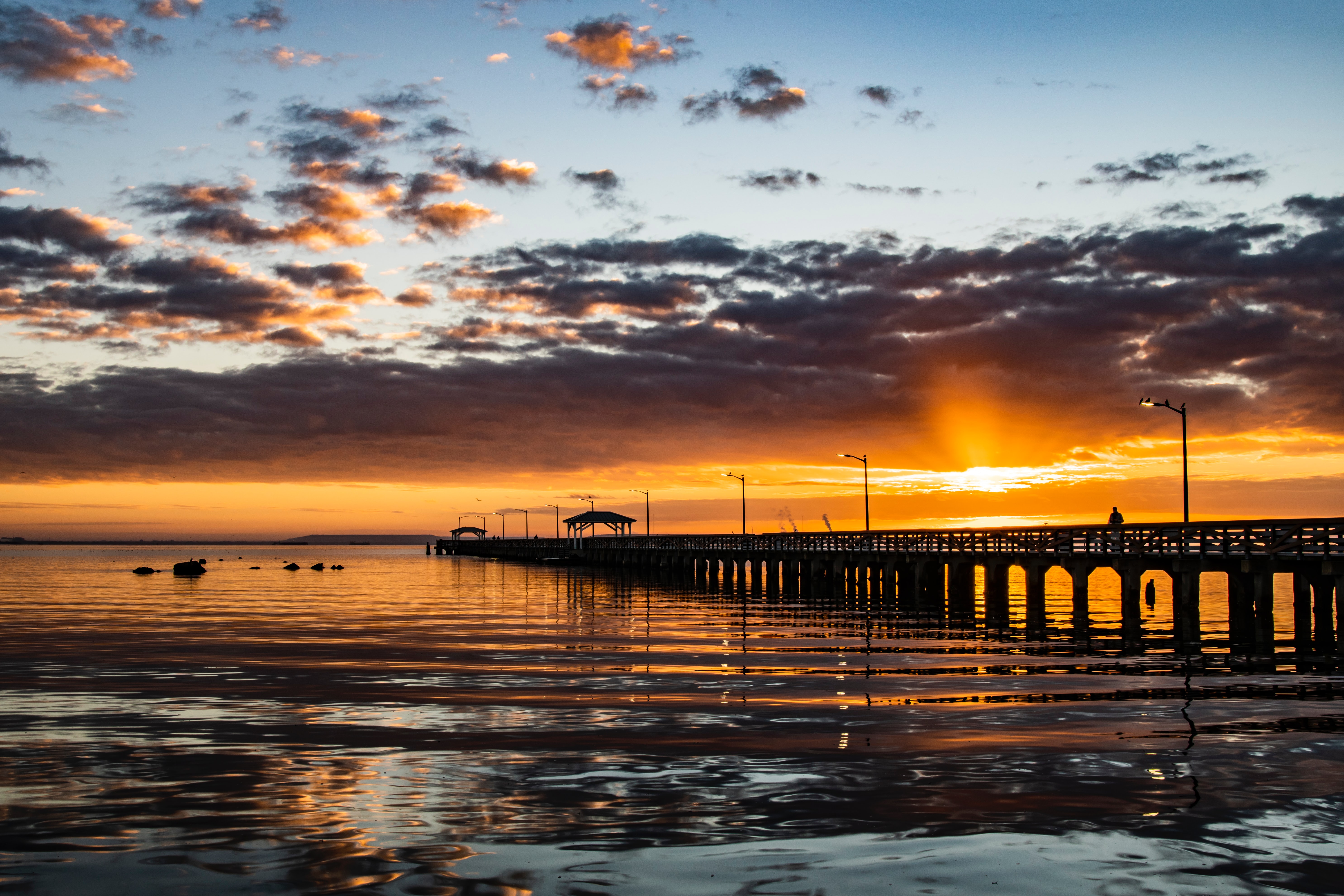 A Tampa Bay waterfront pier at sunset